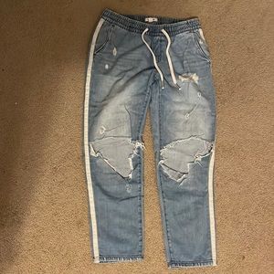 Garage distressed jeans with white stripe
